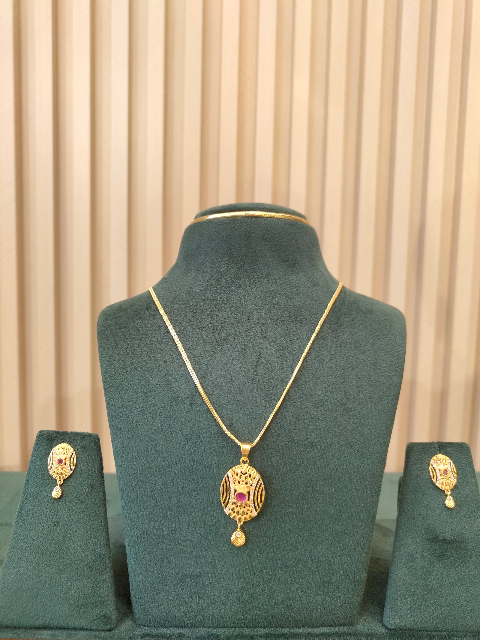 The Dazzling Gold Pendant and Earrings Set